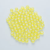 BD00063-02-white-letter-bright-yellow-transparent-coin-alphabet-beads-mix-4×7mm